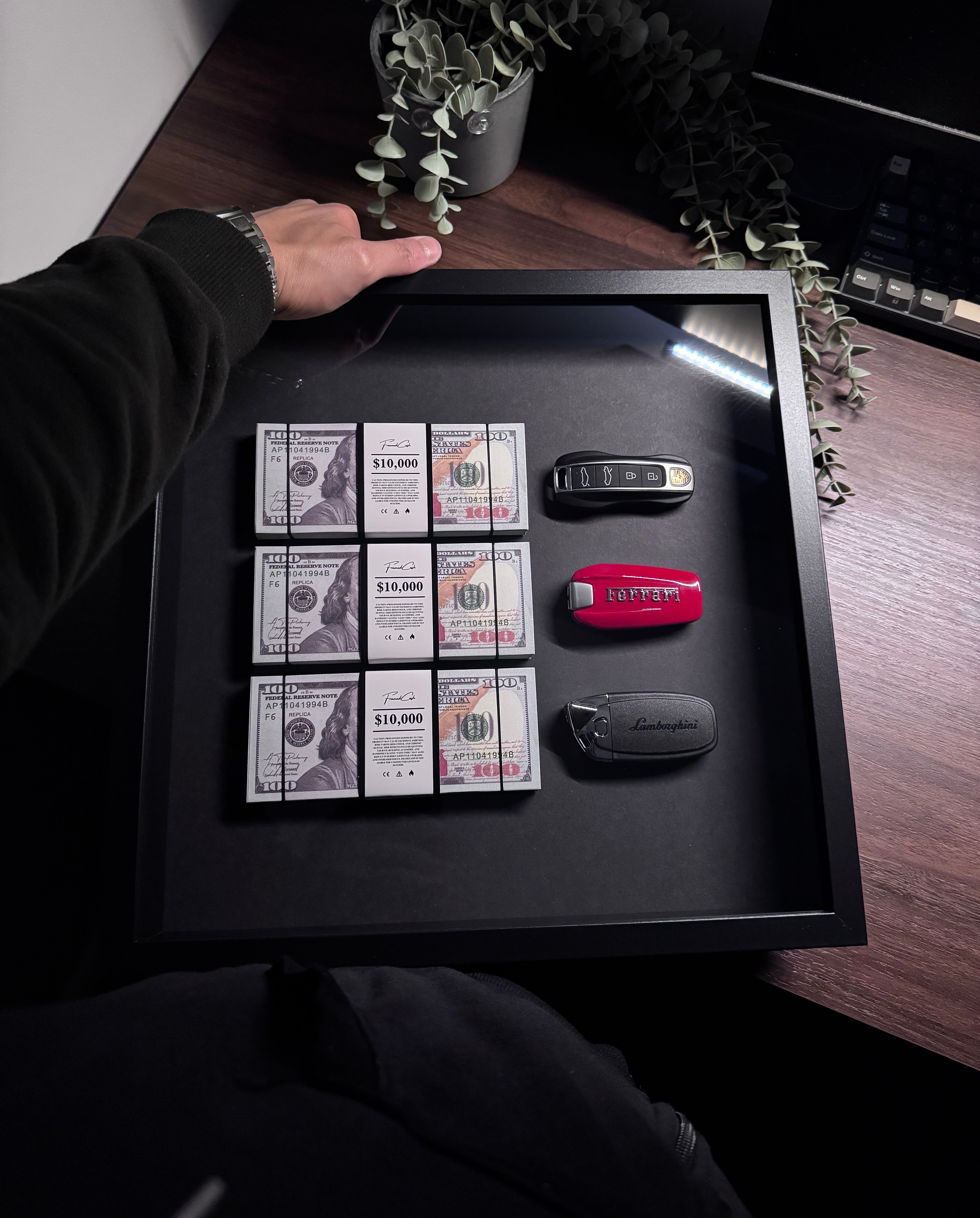 The Wealth Display – USD & Supercar Keys